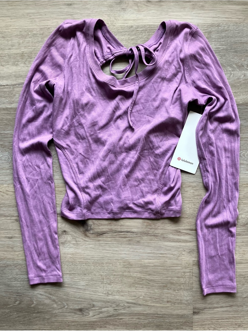 Lululemon Lavender Open Back Ribbed
Long Sleeve Shirt. Size 8, NWT